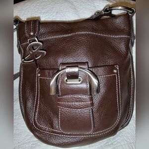 B. Makowsli Chocolate Brown Crossbody Bag.